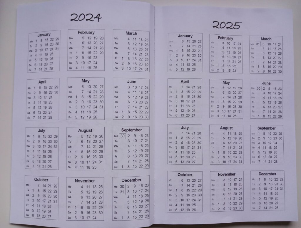 This photo shows the 2024 and 2025 calendars from the 2025 travel diary